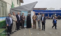 بازدید سیدشمس شفیعی و محسن سماکچی اعضای شورای اسلامی شهر رشت از نمایشگاه غذاهای محلی و صنایع دستی گیلان در مدرسه مصطفی کریمی با همراهی خانم دکتر کریمی معاون ابتدایی آموزش و پرورش ناحیه دو رشت